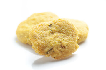 Close-up of freshly baked spicy and salted Mathri or matthi, traditionally authentic Rajisthani . Isolated over studio white background