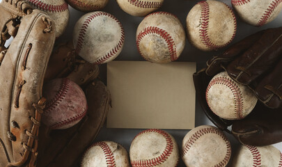 Top view of old vintage baseballs with grunge texture and note with copy space for sports game.