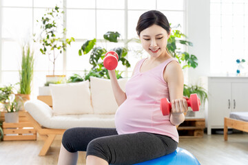 Asian pregnant woman workout