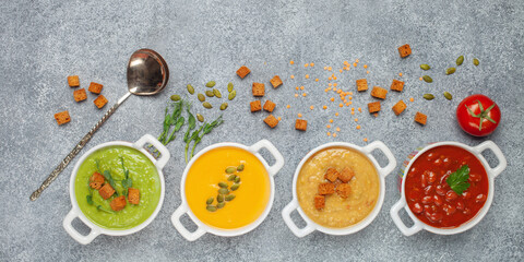 Obraz na płótnie Canvas Set of vegetables soups. Pumpkin , green peas , lentil soup with ingredients. Dishes, food. Top view.