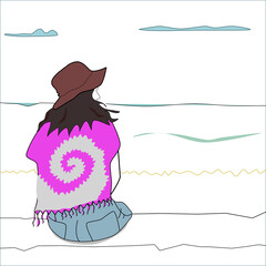 A woman sitting looking over the sea