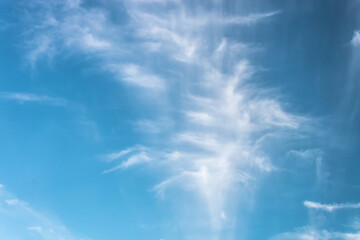 Clouds in the blue sky on a bright cloudy day