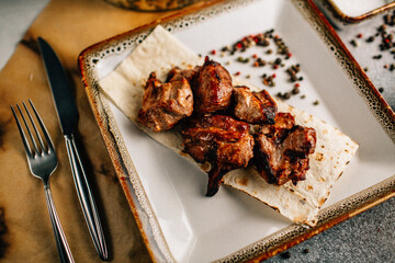 Cooked meat on a plate