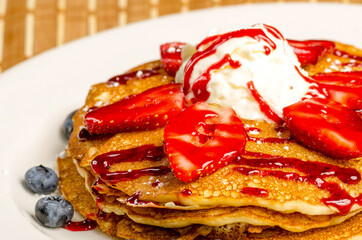 Delicious Pancakes with Strawberries and Ice Cream
