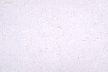 white concrete surface and white paint peeling from the wall, for use as a background.