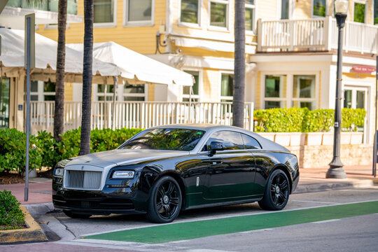  Photo of a Rolls Royce parked in Miami Beach by a bike lane