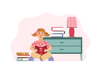 Young cute kid girl sitting and read book at home, library or kindergarten.