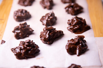 Chocolate rocks made with almonds and caramel.