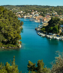 Yachts and boats in paxos harbour on the ionian greek island holiday resort. - obrazy, fototapety, plakaty