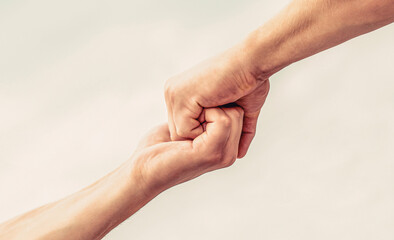 Helping hand outstretched. Friendly handshake, friends greeting, teamwork