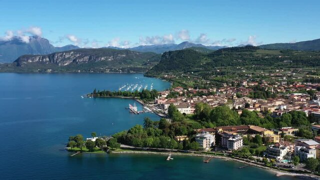 Panorama of the historic town of Bardolino. Top view of the historic part of the city of Bardolino on the coastline of Lake Garda. Aerial view of Bardolino, Lake Garda, Italy.	