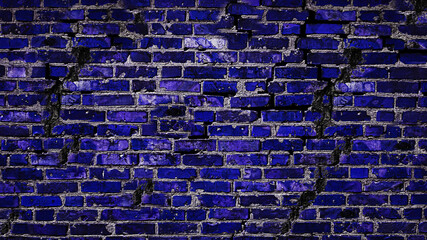 Dark blue brick wall with a crack. Copy space. Antique wall background. Brick wall texture in blue.