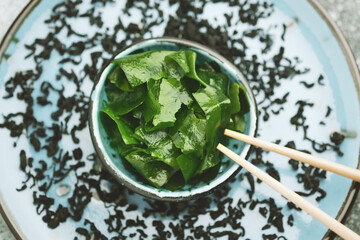 Soaked and dried wakame seaweed. Japanese food. Healthy seafood