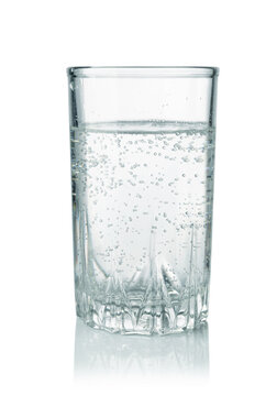 A glass of sparkling water isolated.