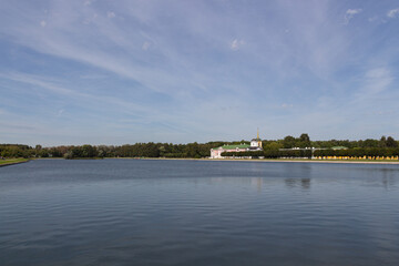 Fototapeta premium Landscape view to the pond, The Palace of Kuskovo and the church