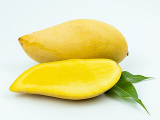 Yellow mango and mango slice isolated white background