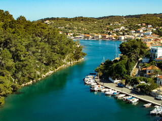 Naklejka premium Yachts and boats in paxos harbour on the ionian greek island holiday resort.