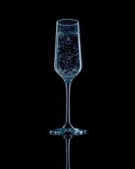 Champagne flute with bubbles light with blue