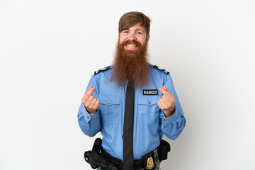 Fototapeta premium Redhead police man isolated on white background making money gesture