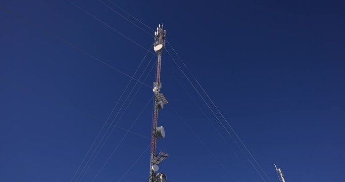 A snapshot from an insightful documentary on 3G, 4G and 5G telecommunication towers, with a detailed look at the infrastructure of tall towers