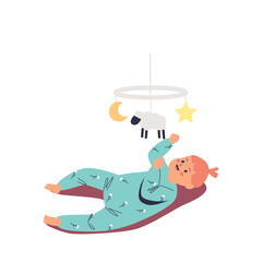 Cute infant baby lying on back and playing with toy carousel. Happy newborn little girl has fun