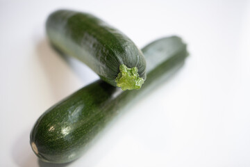 Zucchini on white background
