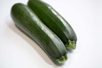 Zucchini on white background