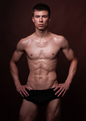 Fitness male model in studio