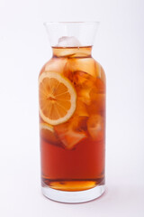 jar glass of iced tea with lemons