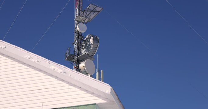 Take a look at the mesmerizing tall structure of the cellular communication tower, with transmittal wires and antennas attached to the structure