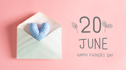 Father's Day message with a blue heart cushion