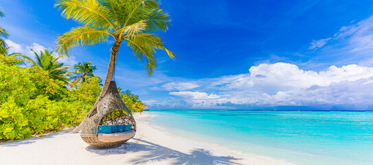 Tropical beach paradise as summer landscape, beach swing hammock and white sand, calm sea serene...