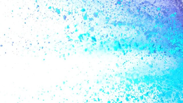 Super Slow Motion Shot of Blue Powder Explosion Isolated on White Background at 1000fps.