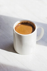 Cup of coffee on a white background. - 436735793