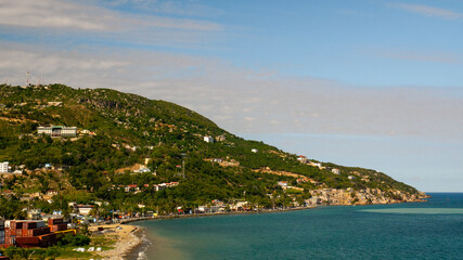 Fototapeta na wymiar Cap Haitien, Haiti. View on cityscape and and entrance to the bay.