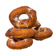 fried donuts in powdered sugar on a white isolated background.