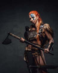 Norway woman barbarian wearing armor and holding a huge axe