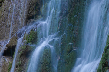Fototapeta na wymiar Mountain day summer. Waterfall