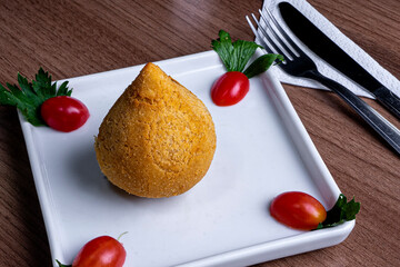 Coxinha is a Brazilian snack, from S&atilde;o Paulo, also common in Portugal.