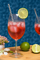 glass of red wine with lemon