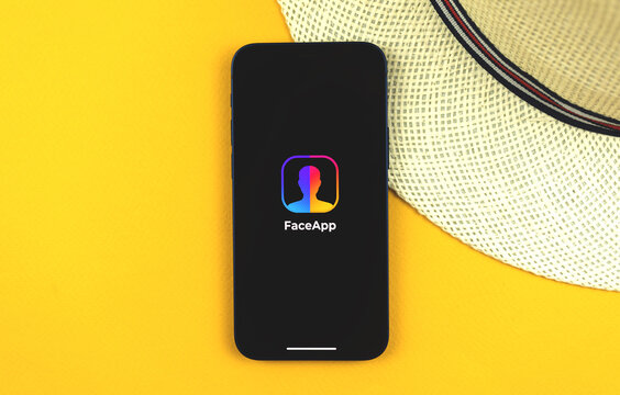 Kharkov, Ukraine - May 28, 2021: Faceapp app logo on the screen of Apple iPhone 12