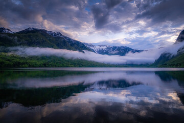 Foggy sunset at the Bohinj Lake in Slovenia.