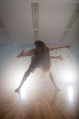 Group of multiracial dancers are exercising and practicing in their studio in slow motion