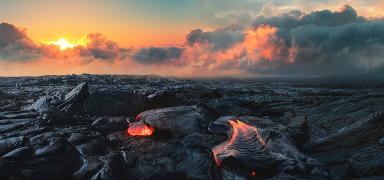 Lava Field under sunset clouds on background