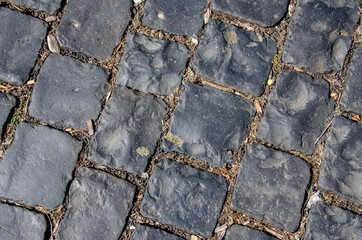 Fragment of a paved cobblestone street in Germany 