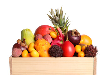 Wooden crate with different exotic fruits on white background