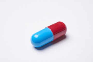 Pill medicine close up on white background, painkiller drug 