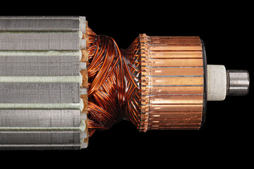 Rotor or of anchor electric motor closeup, isolated on black background