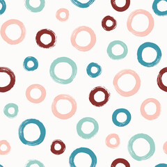 Colorful seamless pattern with rings in brush stroke technique. Vector abstract background with hand painted circles.