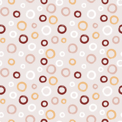 Colorful seamless pattern with rings in brush stroke technique. Vector abstract background with hand painted circles.